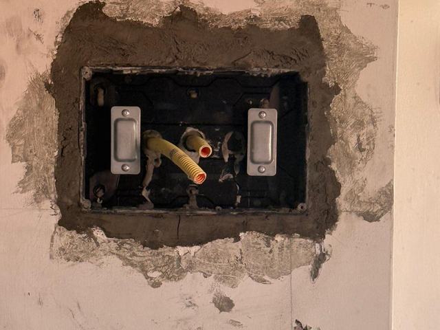 New double switch box set flush into a reworked wall
